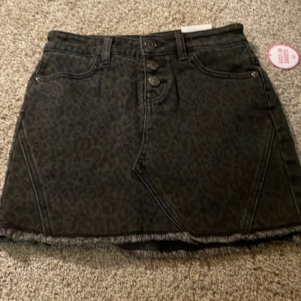 Justice black denim skirt.